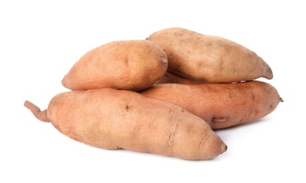 Photo of Heap of whole ripe sweet potatoes on white background