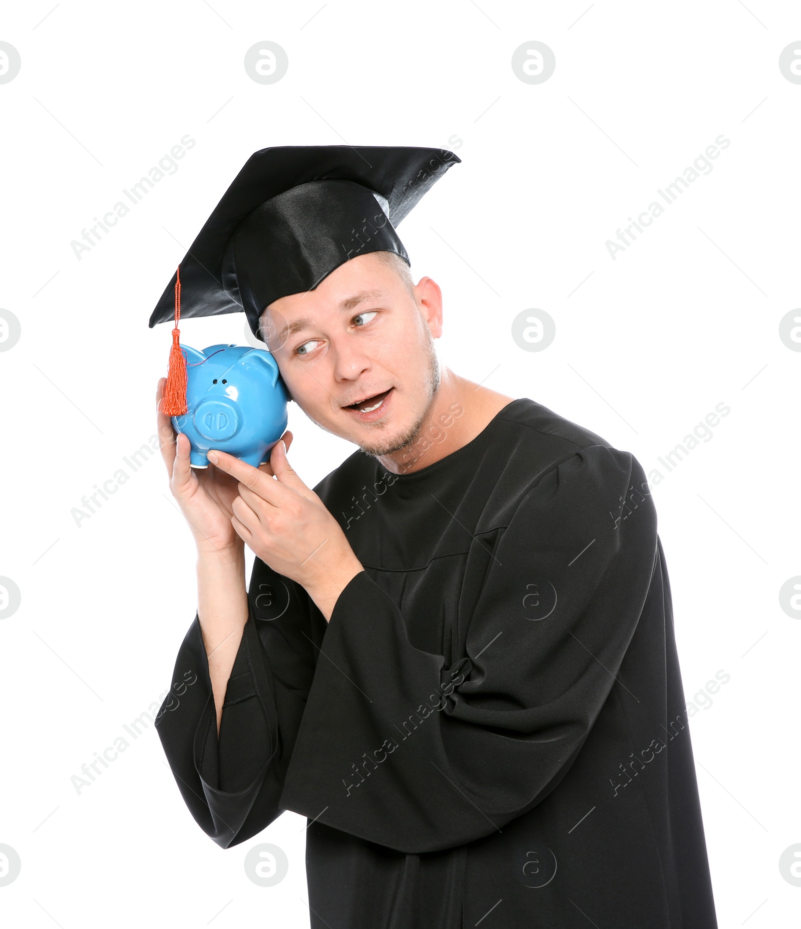 Photo of Portrait of young graduate with piggy bank on white background
