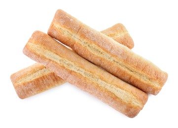 Photo of Tasty baguettes on white background, top view. Fresh bread