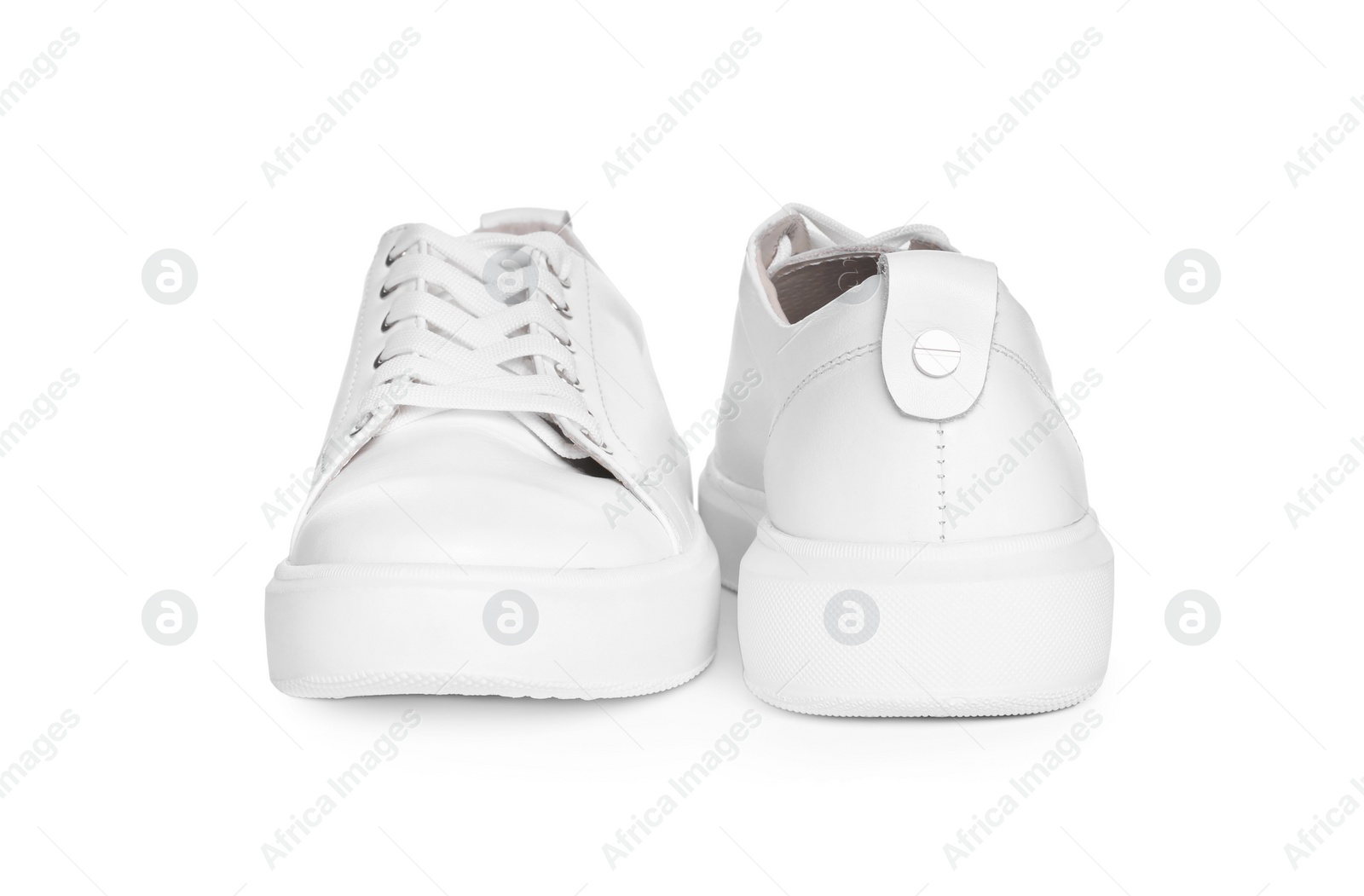 Photo of Pair of stylish sneakers isolated on white