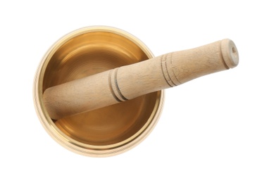 Photo of Golden singing bowl and mallet on white background, top view. Sound healing