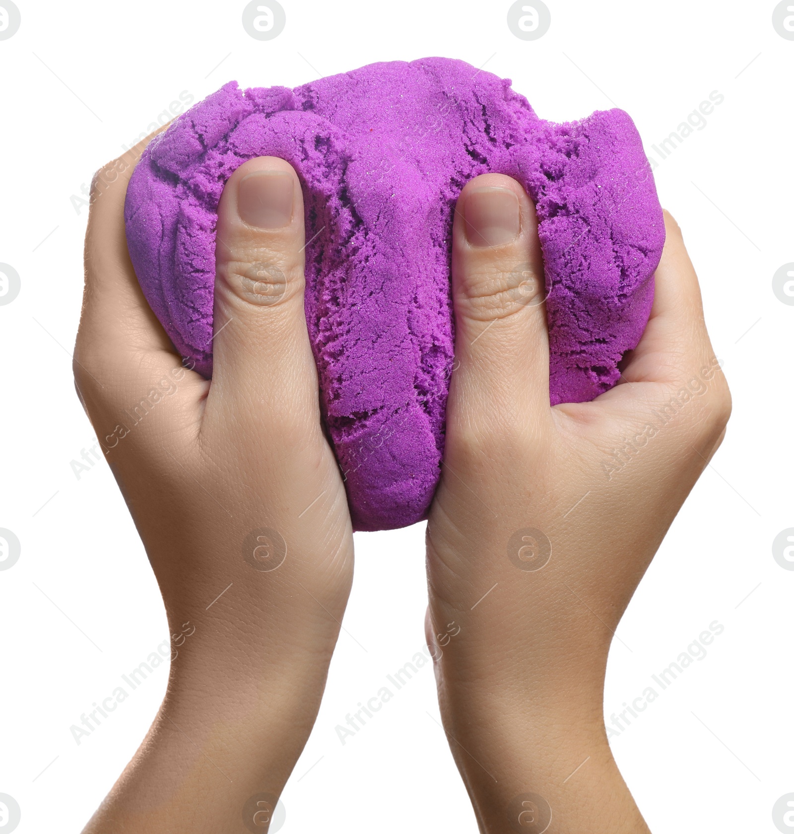 Photo of Woman playing with kinetic sand on white background, closeup