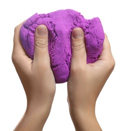 Woman playing with kinetic sand on white background, closeup