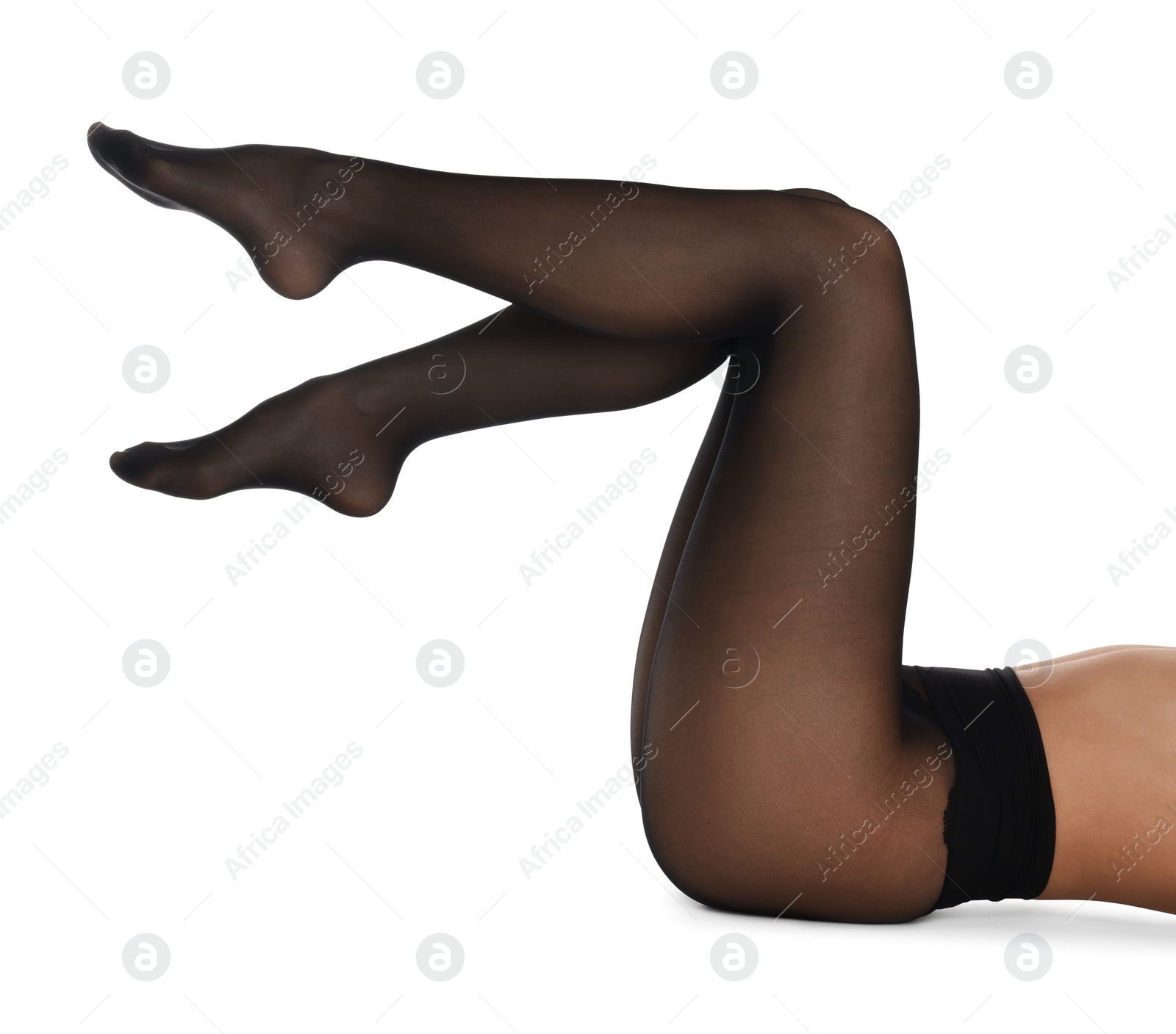 Photo of Woman with beautiful long legs wearing black tights on white background, closeup