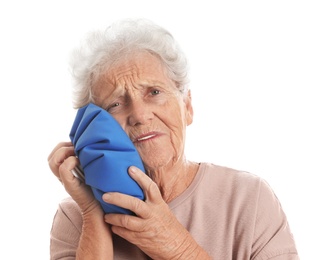 Photo of Senior woman suffering from toothache on white background