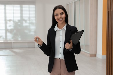 Female real estate agent showing new apartment