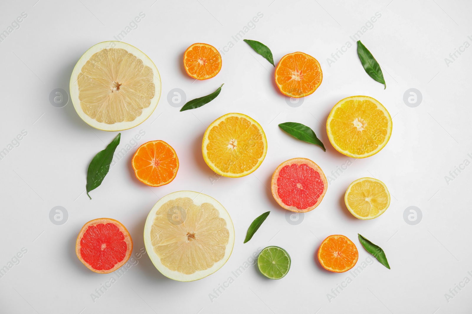 Photo of Different citrus fruits on white background, flat lay