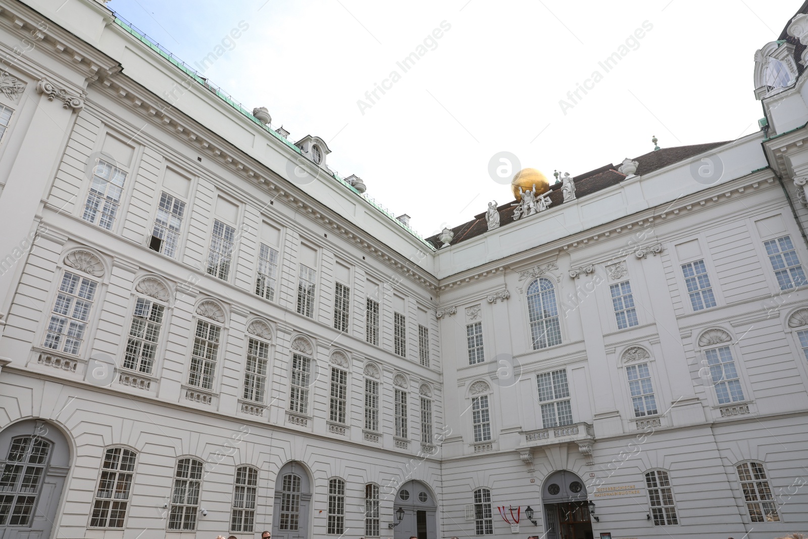 Photo of VIENNA, AUSTRIA - APRIL 26, 2019: Court Library and Augustinian Wing of Hofburg Palace