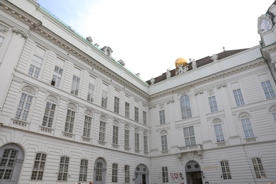 VIENNA, AUSTRIA - APRIL 26, 2019: Court Library and Augustinian Wing of Hofburg Palace