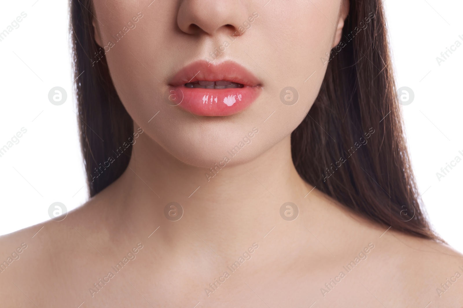 Photo of Closeup view of woman with beautiful full lips on white background