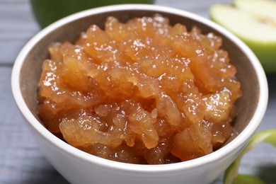 Photo of Delicious apple jam in bowl on table, closeup