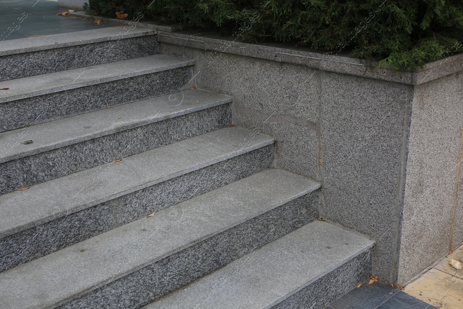 Photo of View of empty grey tile staircase outdoors