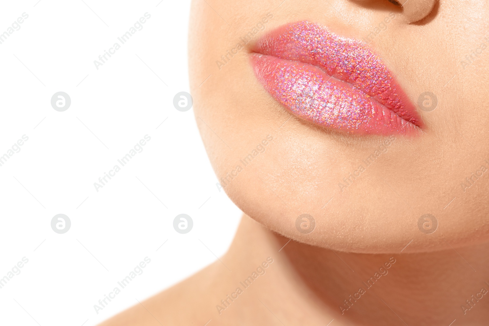 Photo of Beautiful young model with beautiful lips makeup on white background