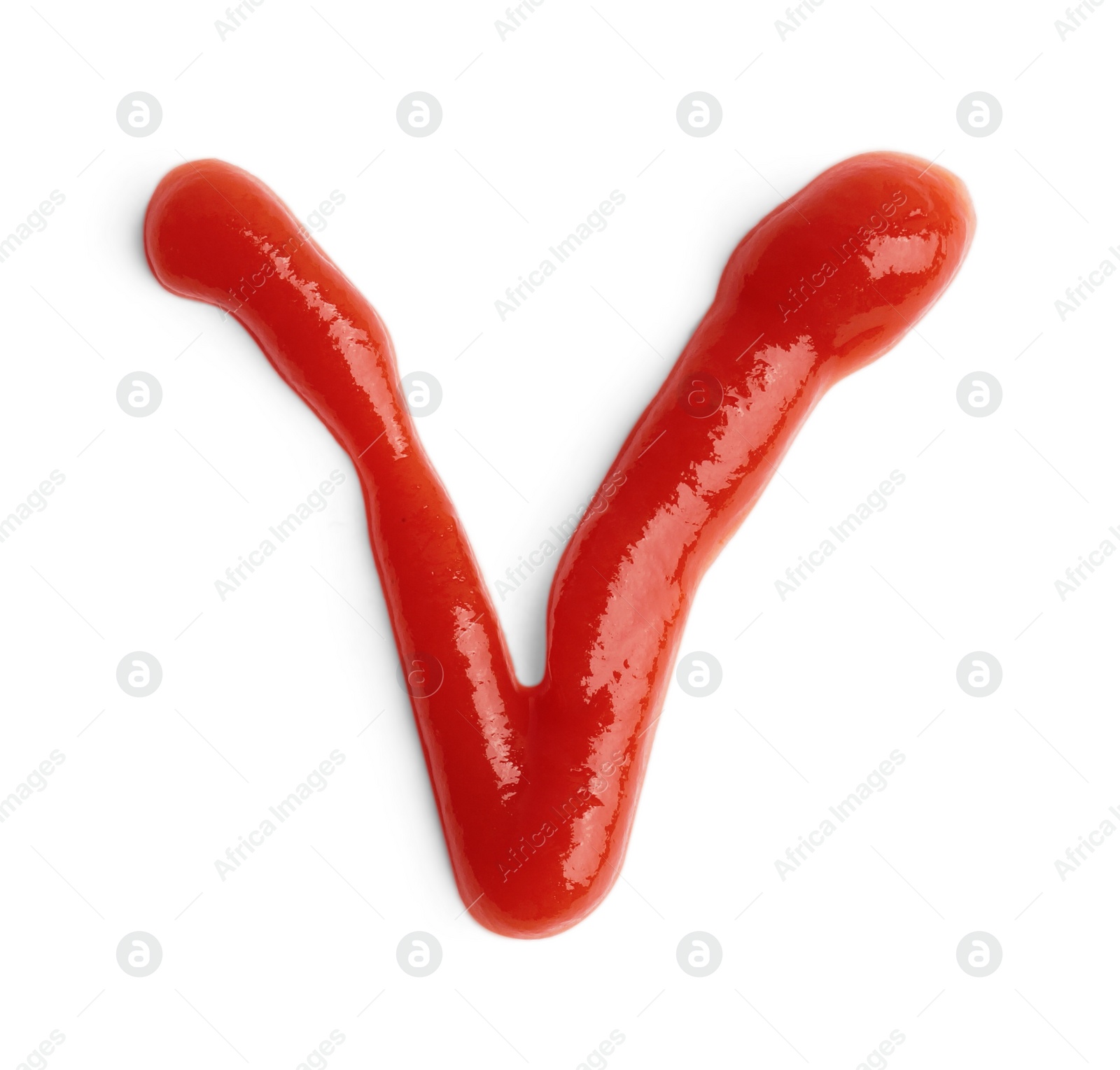 Photo of Letter V written with ketchup on white background