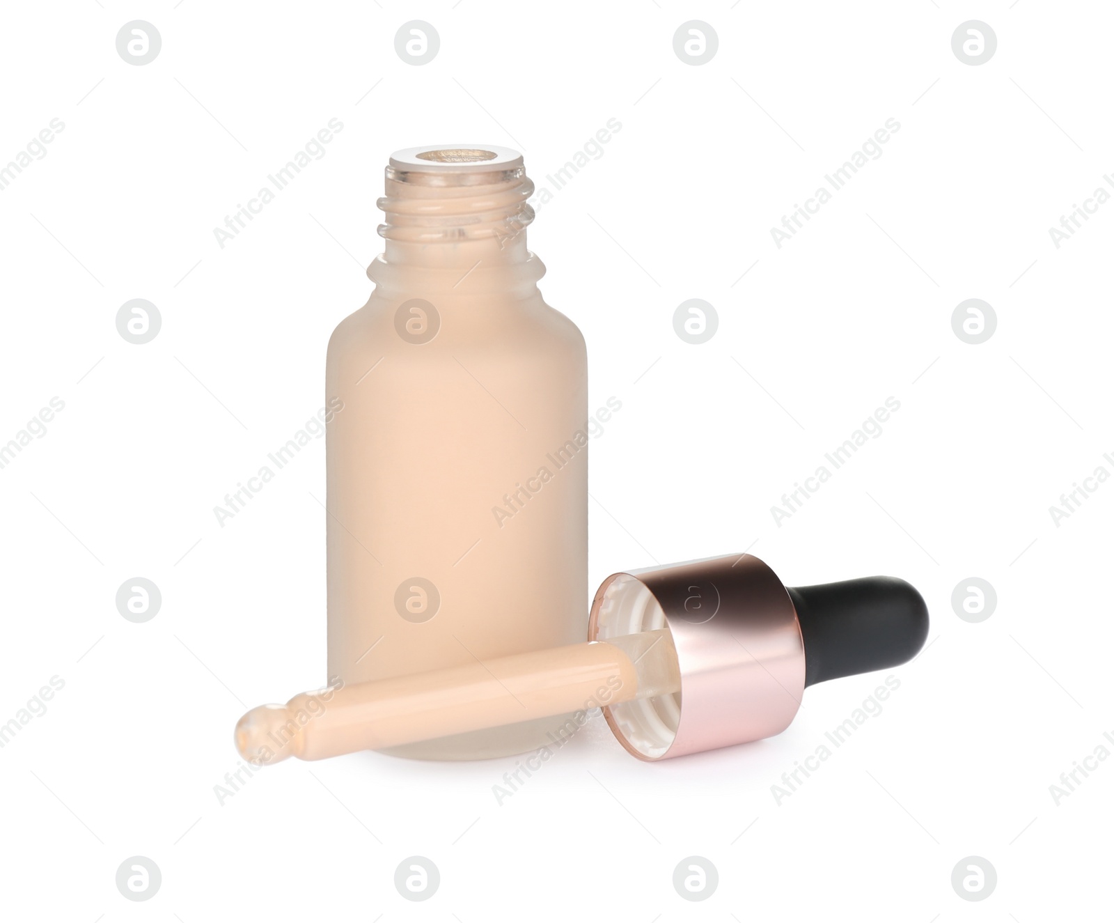 Photo of Bottle of skin foundation isolated on white. Makeup product