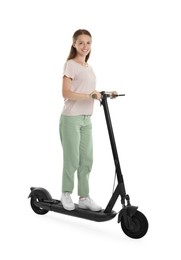 Happy woman riding modern electric kick scooter on white background