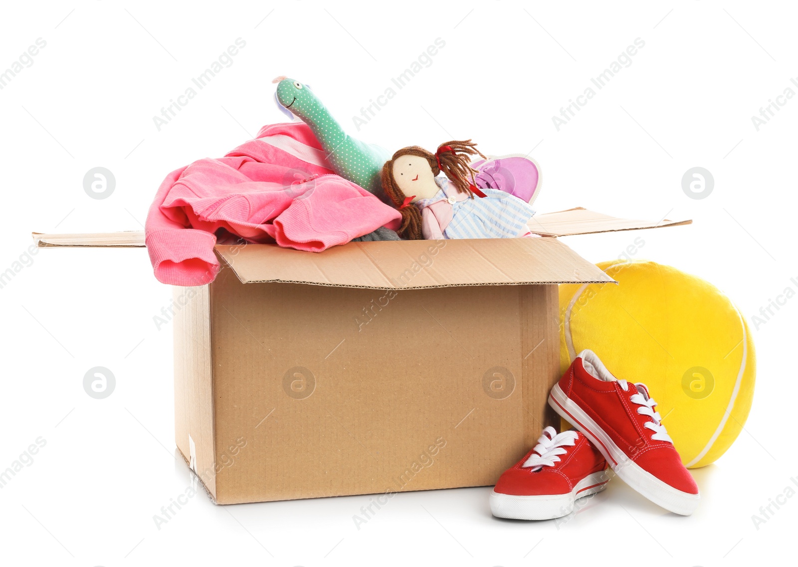 Photo of Donation box, shoes, clothes and toys on white background. Space for text