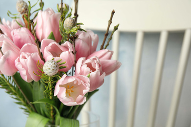 Photo of Beautiful bouquet with spring pink tulips on blurred background, closeup. Space for text