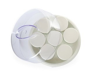 Photo of Modern yogurt maker with jars on white background, top view