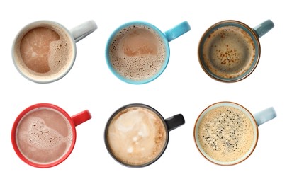 Image of Set of mugs with tasty hot drinks on white background, top view