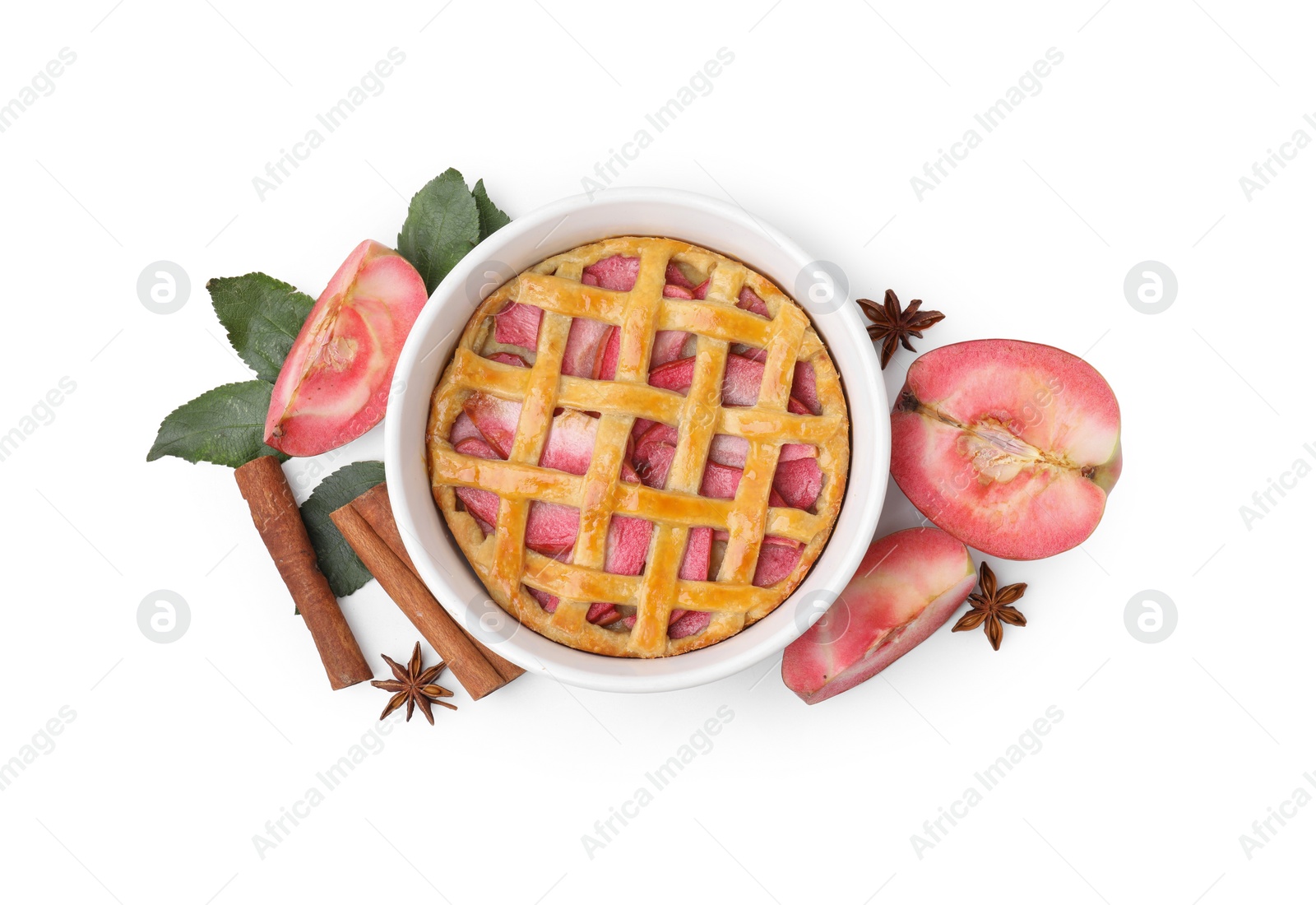 Photo of Tasty apple pie, fruit, leaves and spices isolated on white, top view