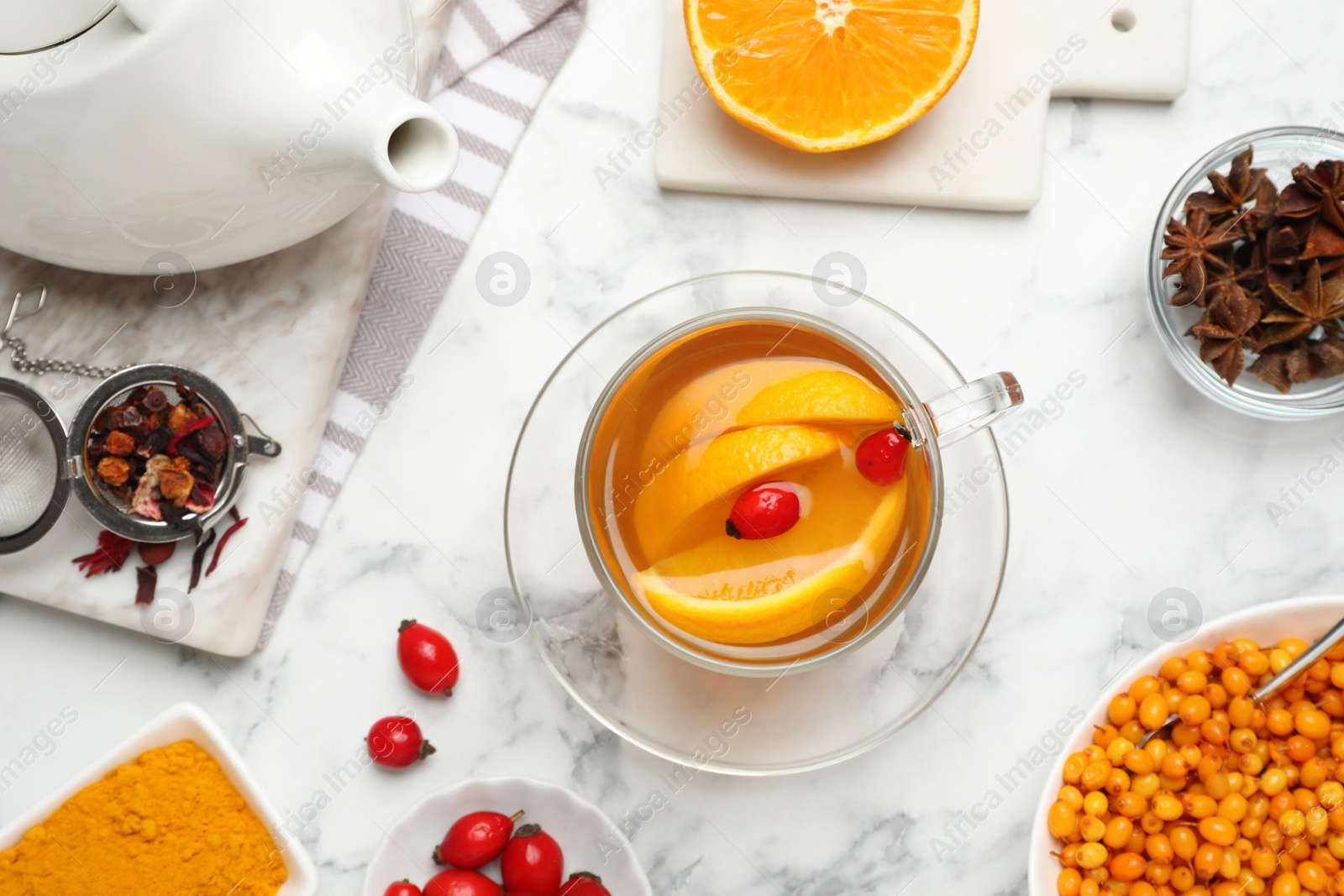 Photo of Flat lay composition with immunity boosting drink on white marble table