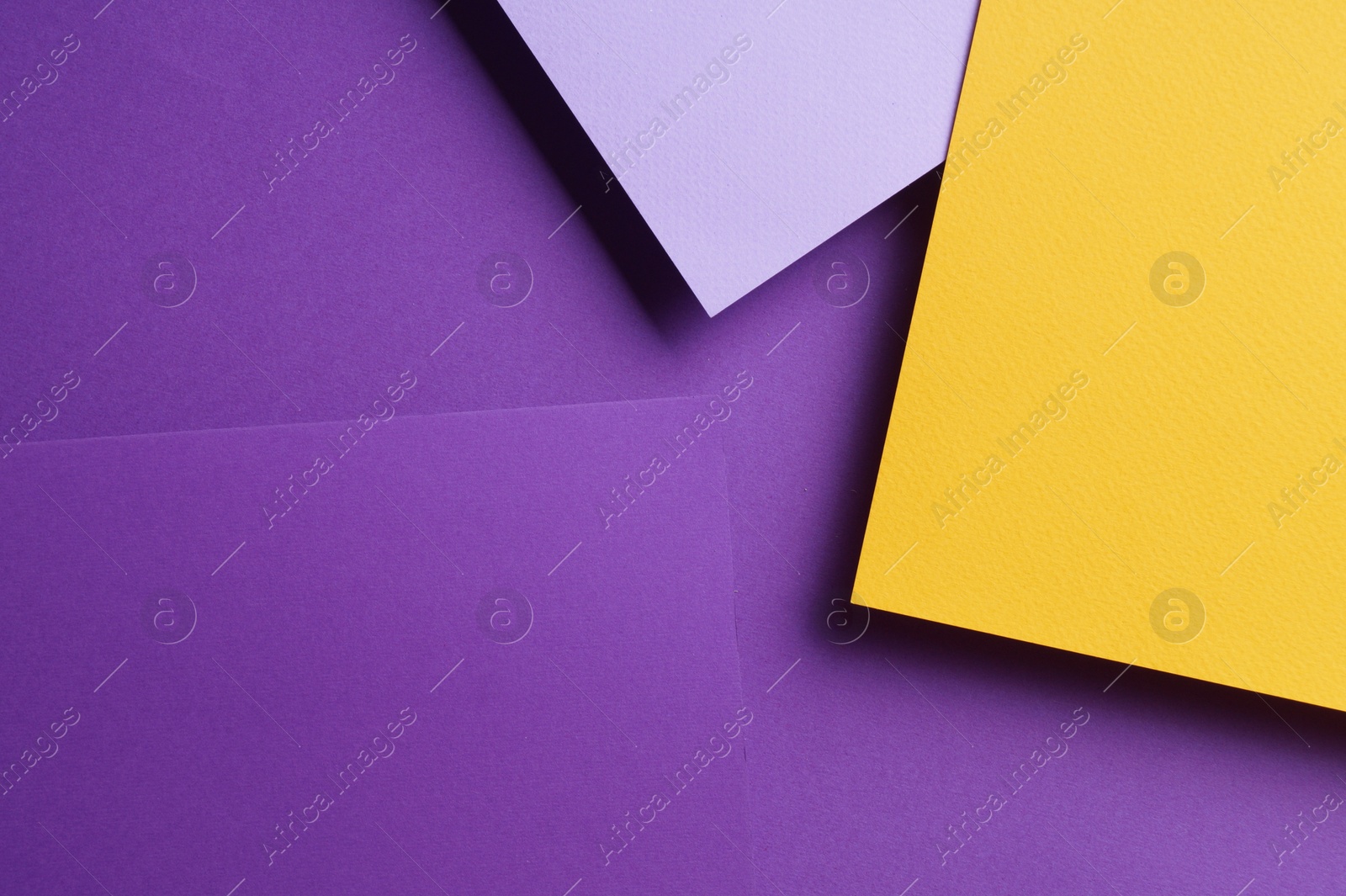 Photo of Colorful paper sheets as background, top view