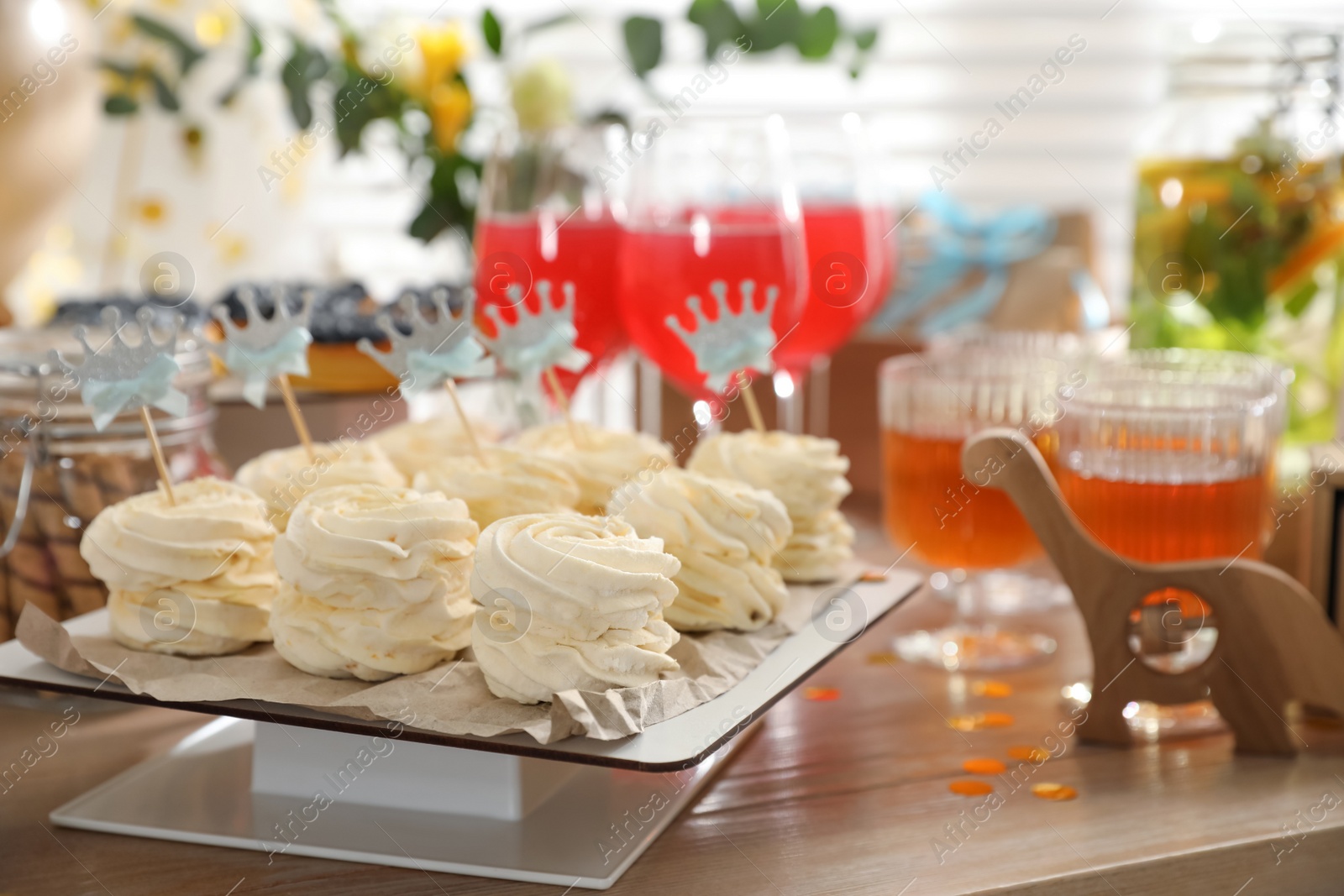 Photo of Delicious party treats on wooden table indoors