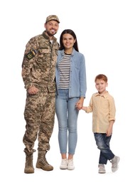 Photo of Ukrainian defender in military uniform with his family on white background