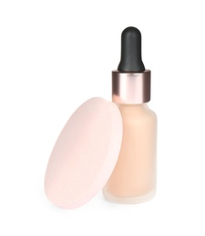 Photo of Bottle of skin foundation with sponge isolated on white. Makeup product