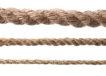Image of Set of durable hemp ropes on white background