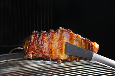 Photo of Delicious ribs on barbecue grill. Yummy meat