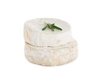 Photo of Tasty camembert and brie cheeses with rosemary isolated on white