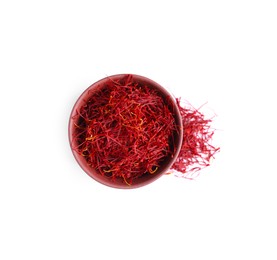 Dried saffron and bowl on white background, top view