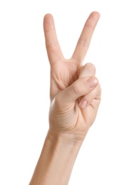 Woman showing two fingers on white background, closeup of hand