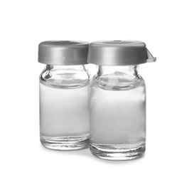 Photo of Medical vials with solution for injection on white background