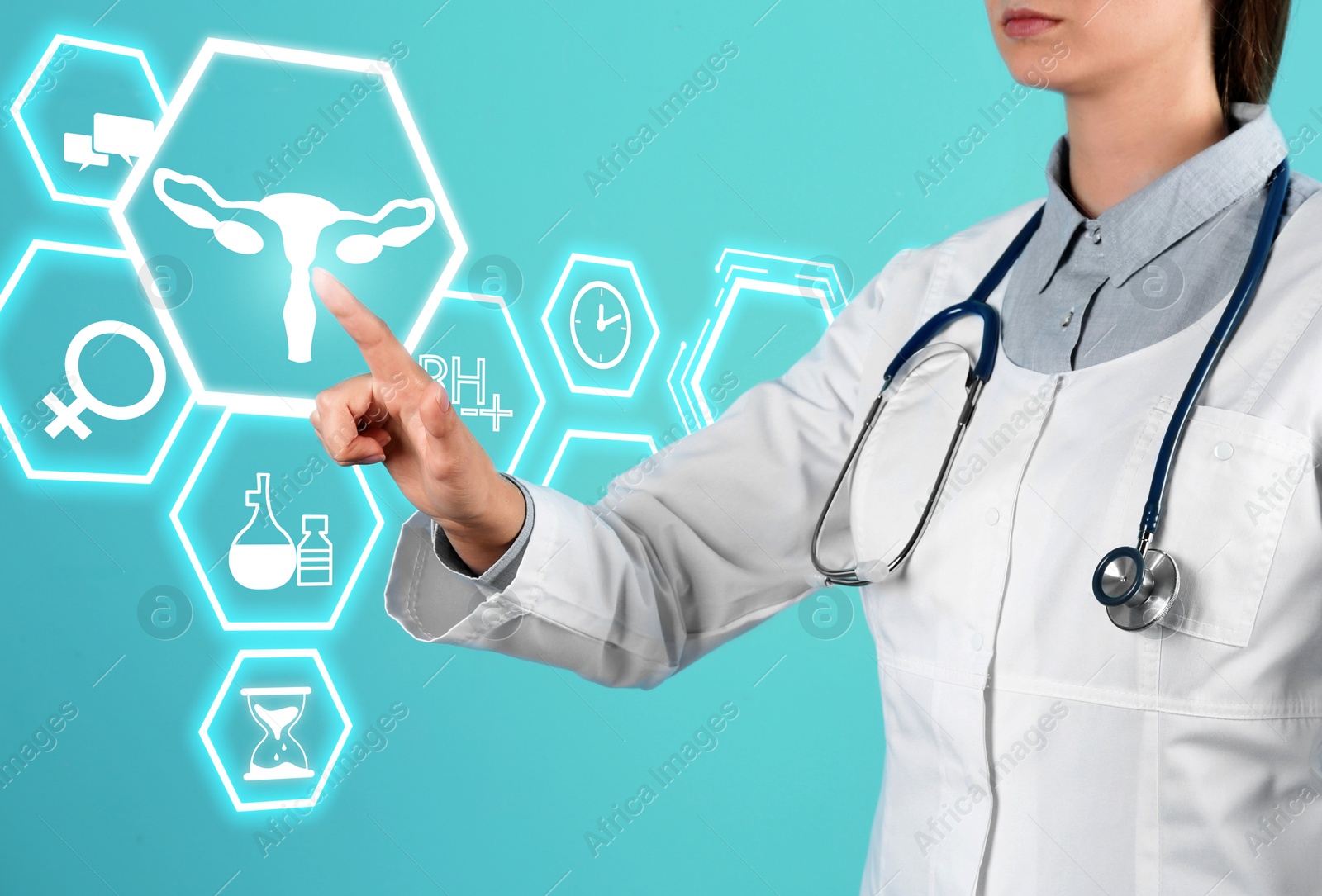 Image of Menopause concept. Doctor touching uterus icon on digital screen against turquoise background, closeup