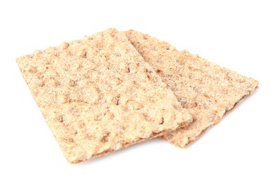 Photo of Fresh crunchy crispbreads on white background. Healthy snack