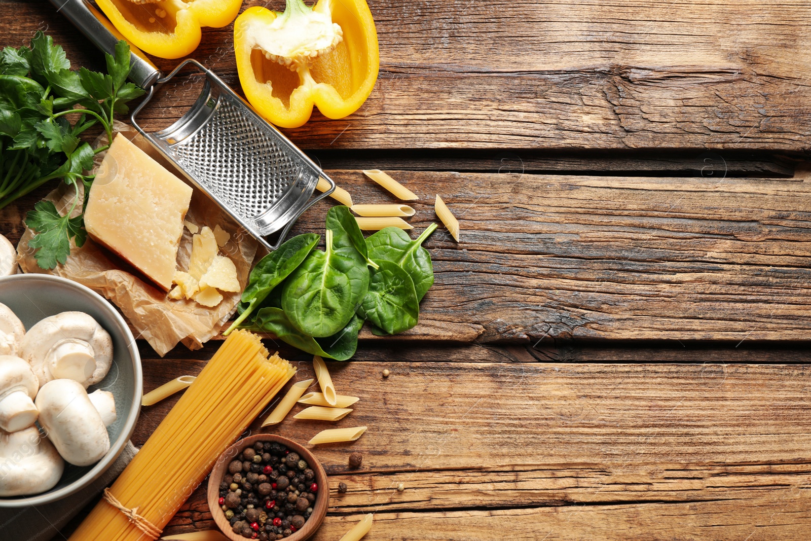 Photo of Flat lay composition with fresh products on wooden table, space for text. Healthy cooking