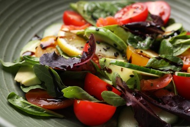 Photo of Delicious vegetable salad in bowl, closeup view