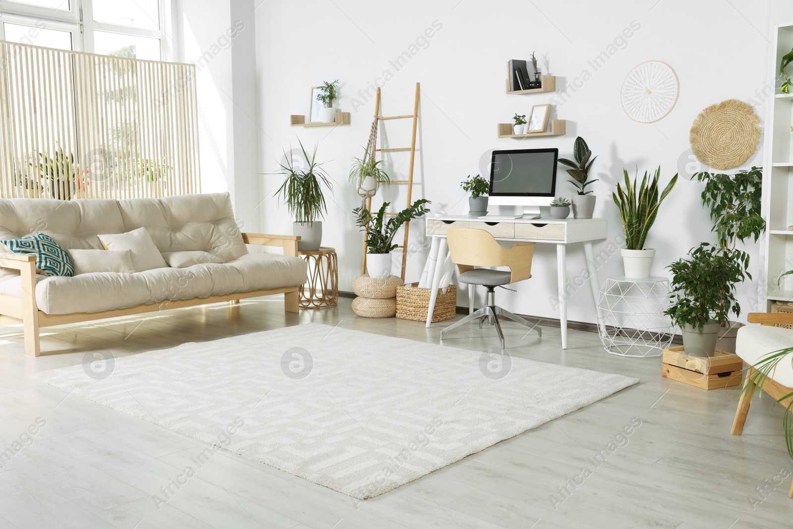 Photo of Stylish room interior with modern furniture and beautiful houseplants