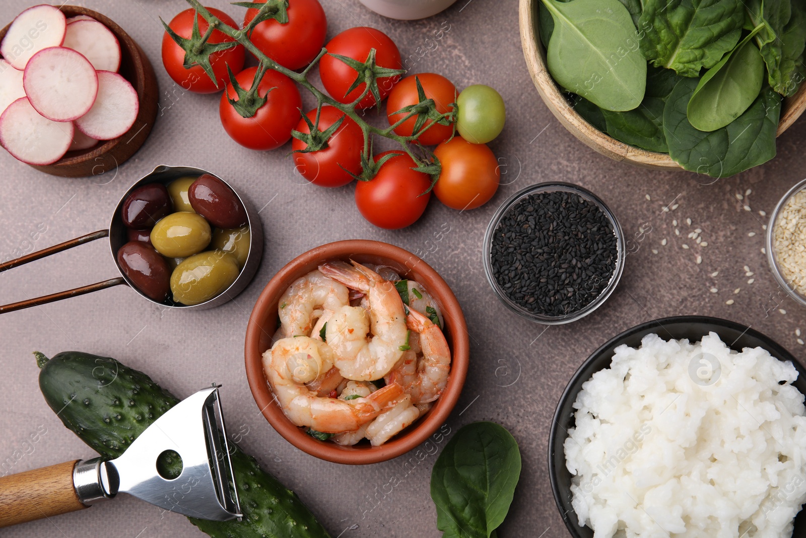 Photo of Ingredients for poke bowl on grey table, flat lay