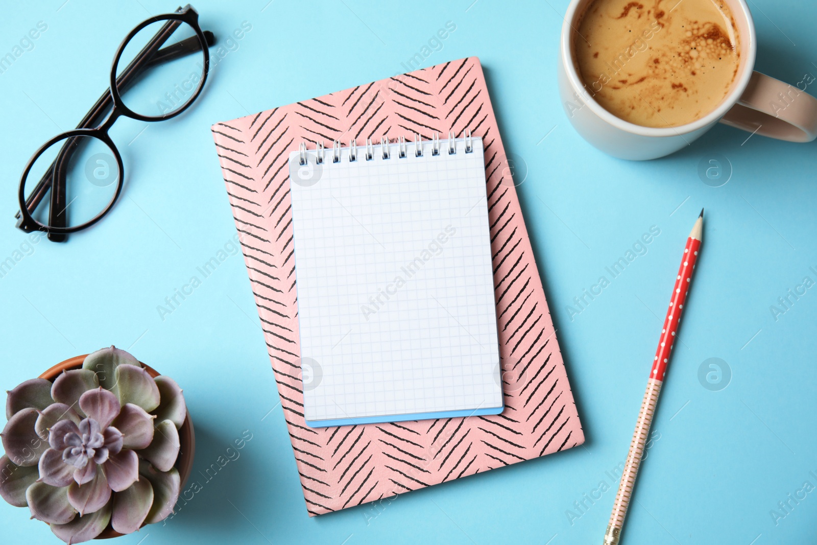 Photo of Flat lay composition with notebooks, coffee and plant on color background