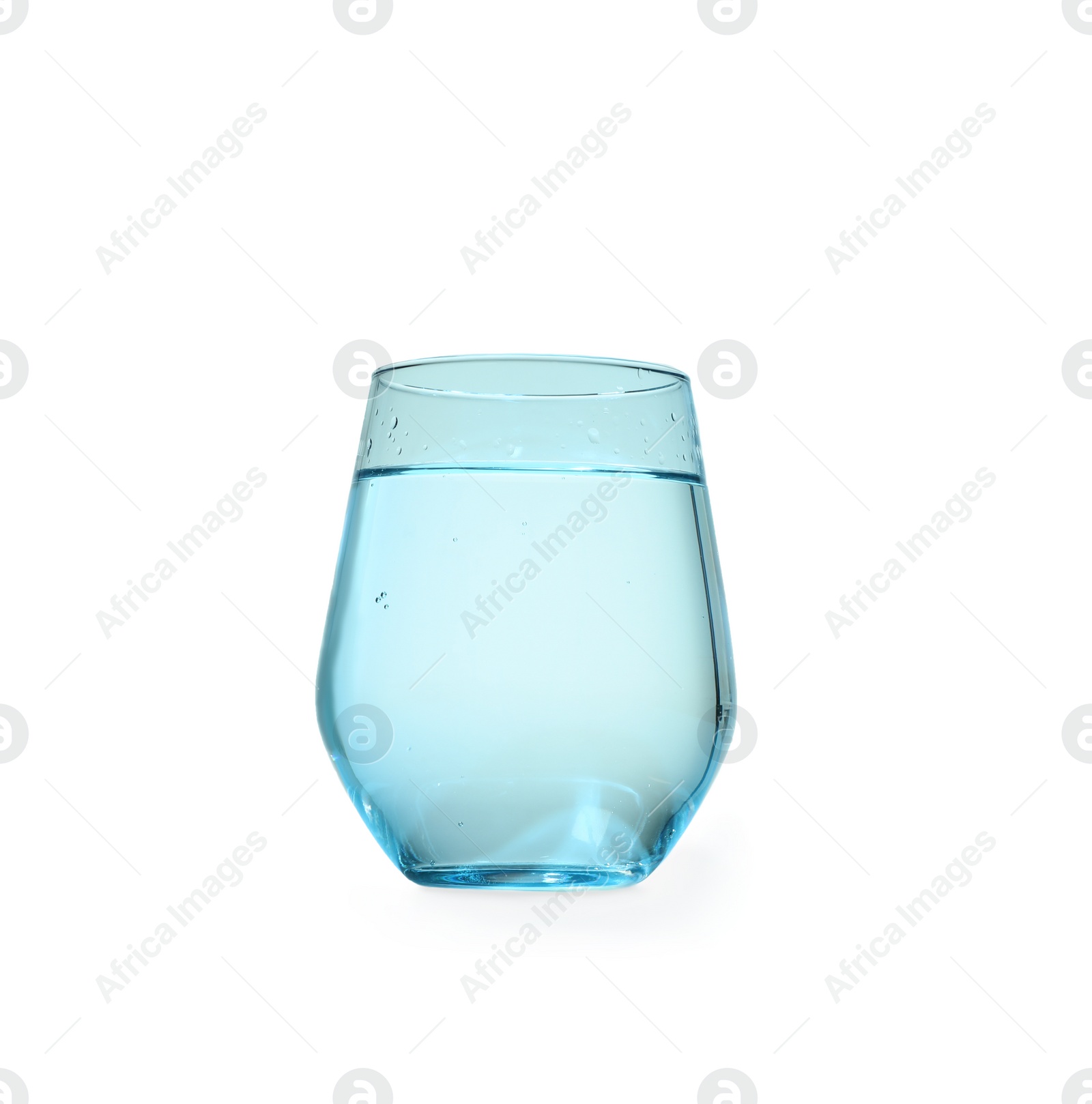 Photo of Glass of water on blue background. Refreshing drink