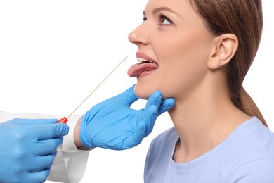 Doctor taking throat swab sample from woman`s oral cavity on white background, closeup