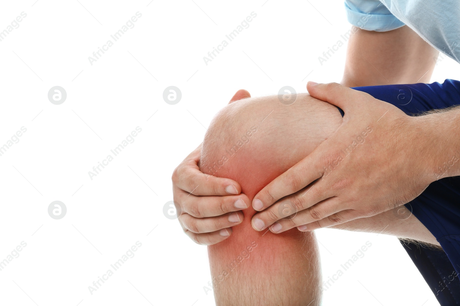 Photo of Man having knee problems on white background, closeup