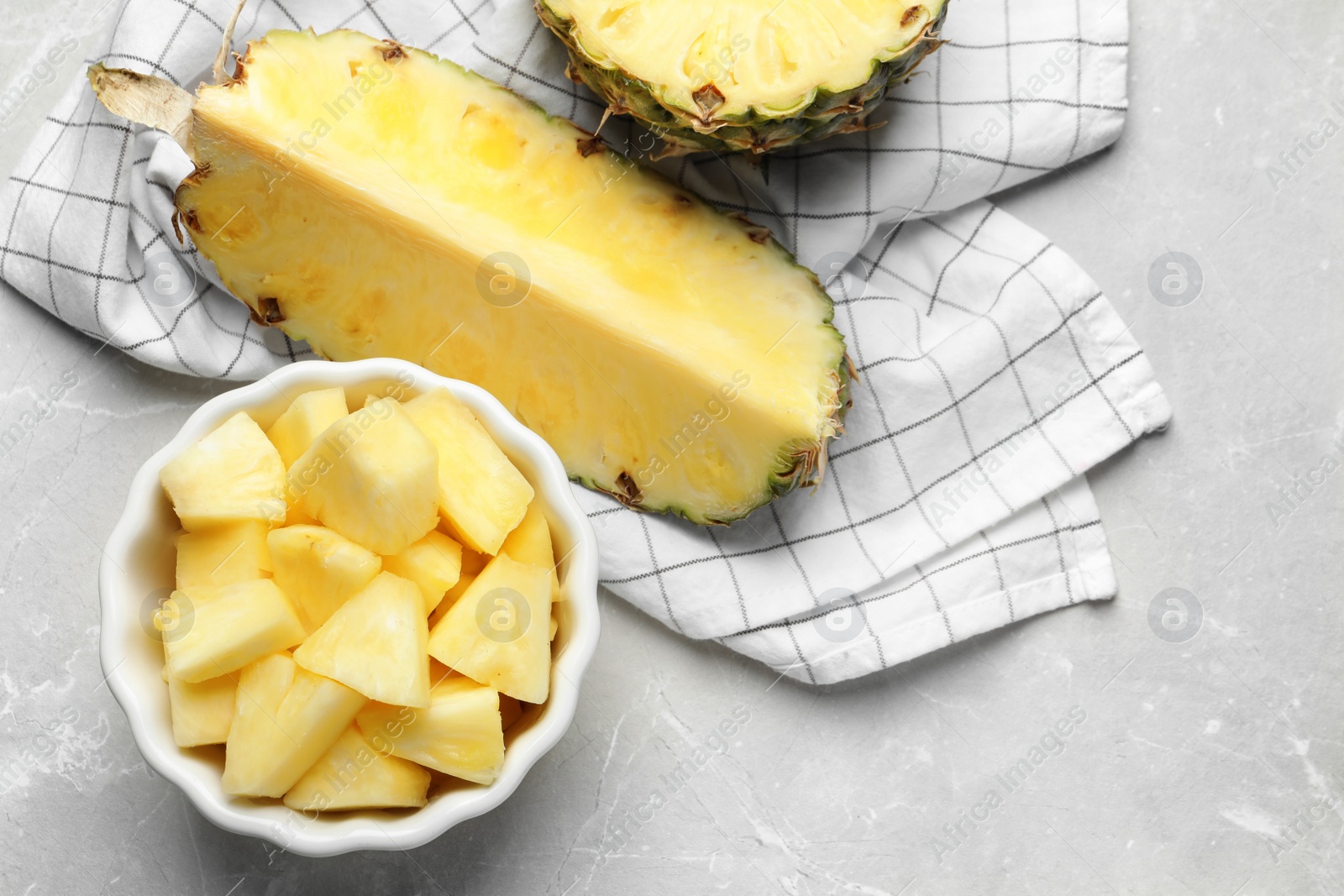 Photo of Composition with fresh sliced pineapple on table