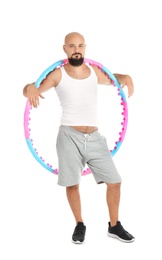 Overweight man with hula hoop on white background