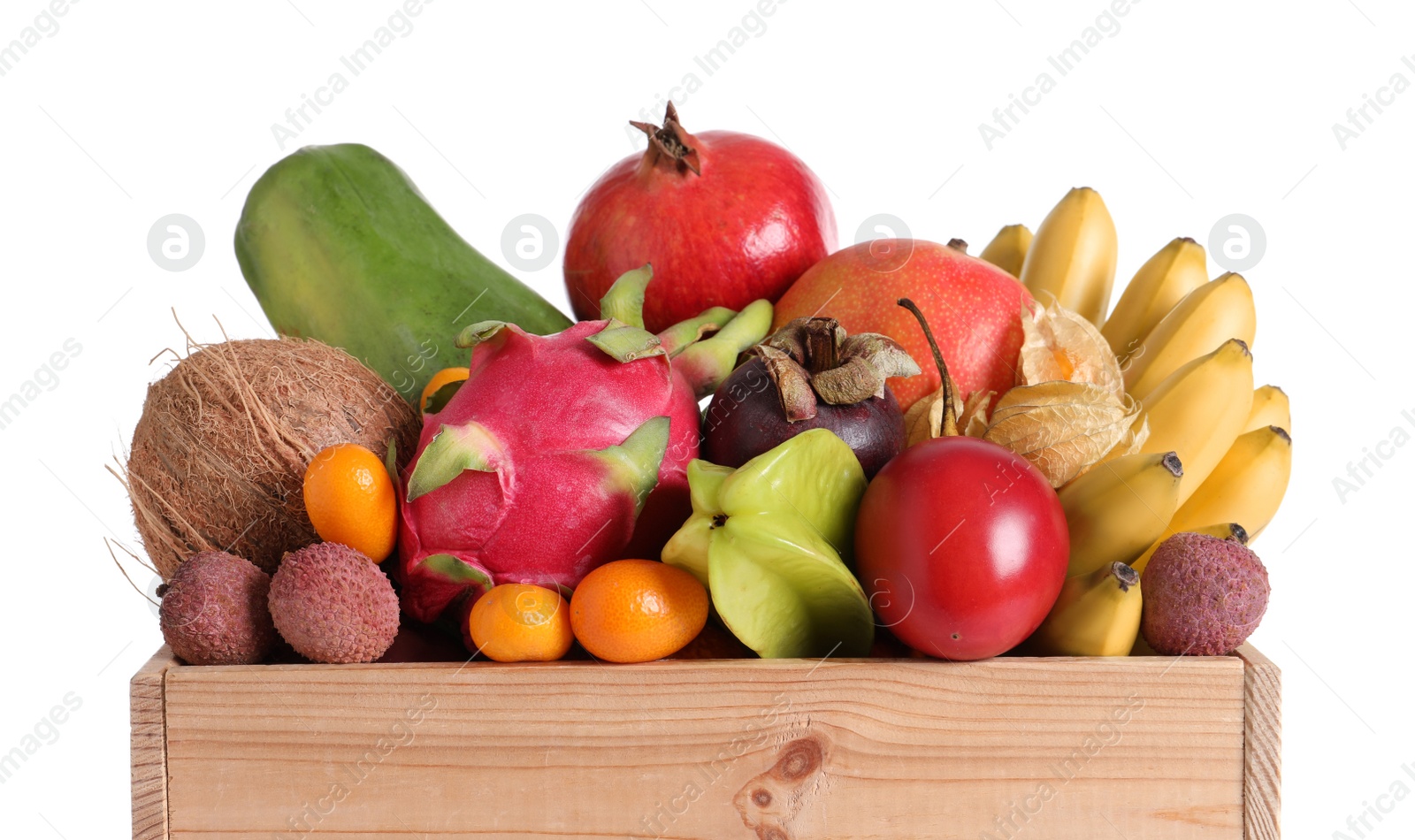 Photo of Wooden crate with different exotic fruits on white background