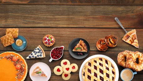 Image of Flat lay composition with different delicious pies on wooden table. Banner design